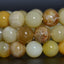 Angelstones Natural Yellow Opal Gemstone 10mm Round Beads Stretch Bracelet 7 Inch Unisex