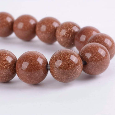 Angelstones Synthetic Goldstone 10mm Round Beads Stretch Bracelet 7inch Unisex