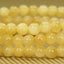 Angelstones Natural Yellow Jade Gemstone 6mm Round Beads Stretch Bracelet 7inch Unisex