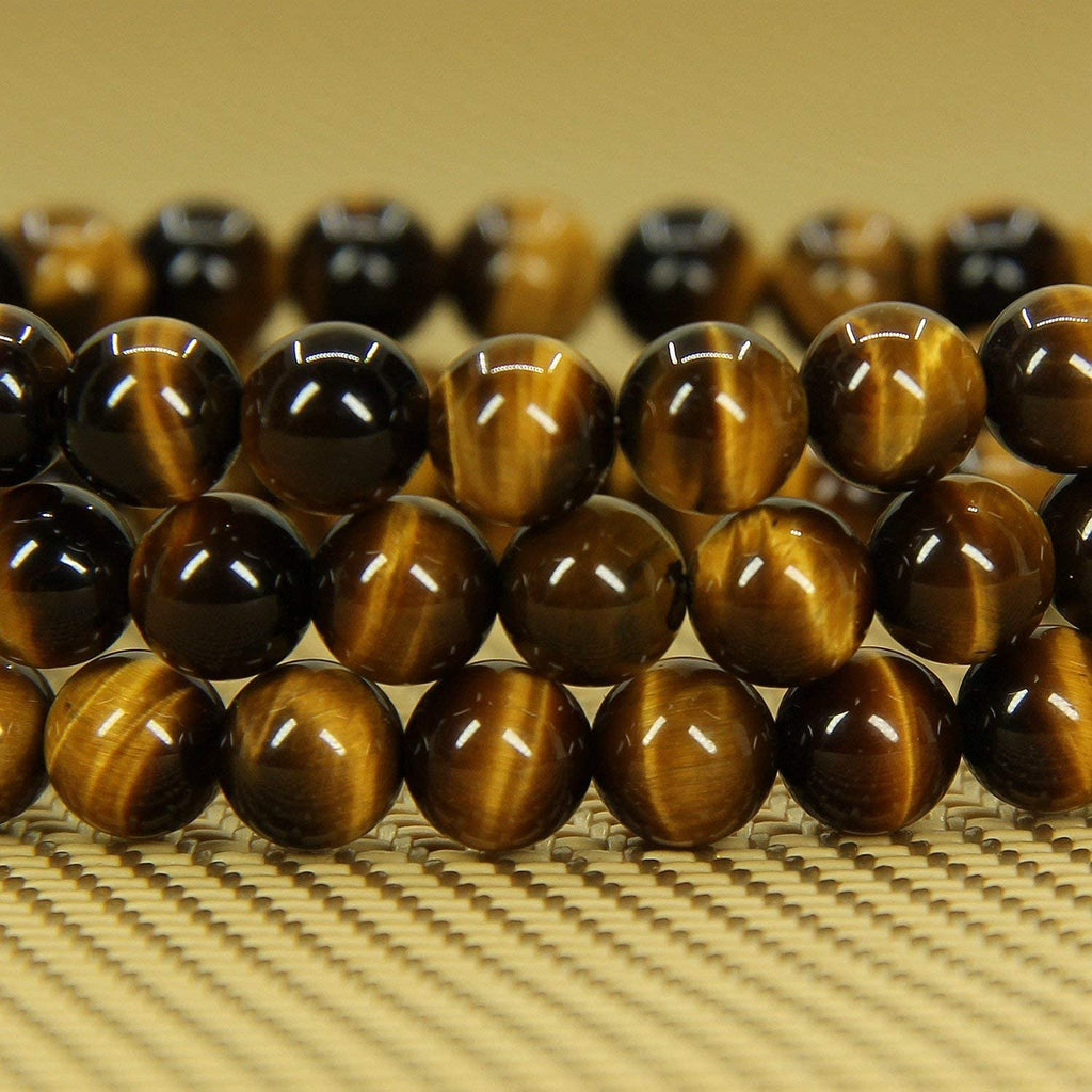 thumbnail image 2 of JaipurJewels 128 Carat Natural Golden Tiger Eye Stretch Bracelet – Round Beads, Gold Color, No Clasp 2 of 3